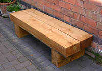 A solid double park bench